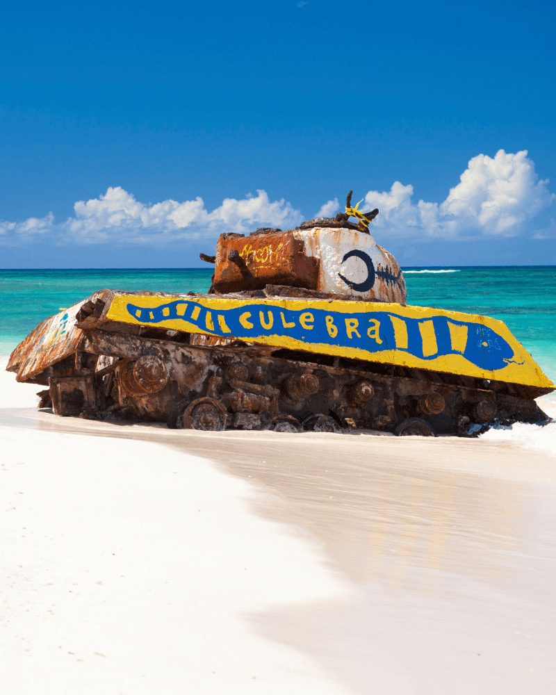 A painted abandoned tank on the white sand at Flamenco Beach, Culebra