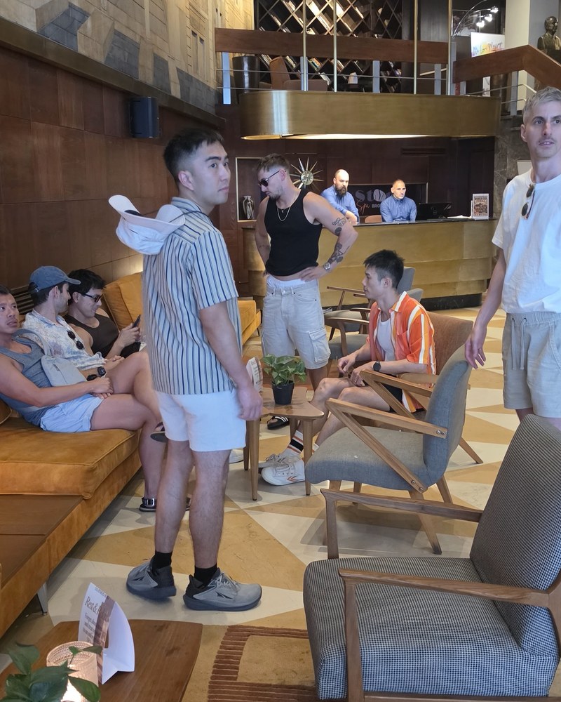 The group meeting each other for the first time in the hotel lobby