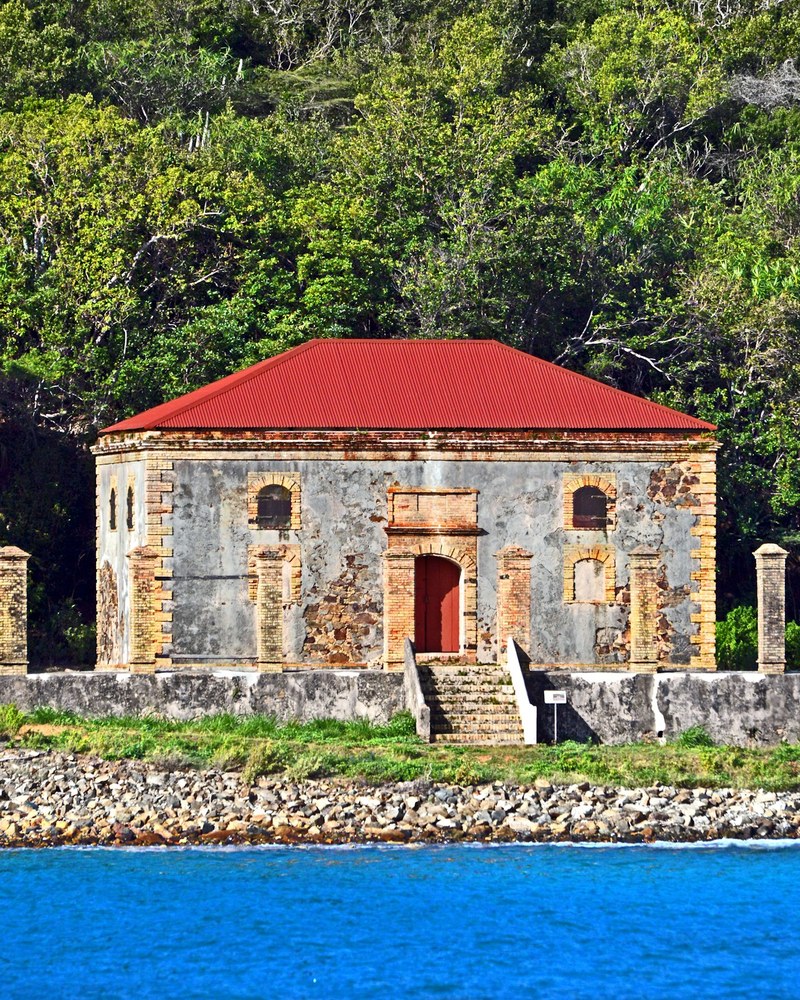 Stone ruins on the green hillside of Hassel Island, in Charlotte Amalie harbour