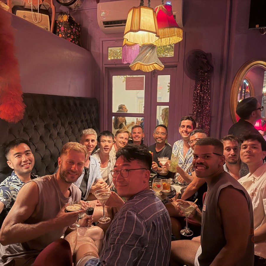 The group out at a bar in the evening